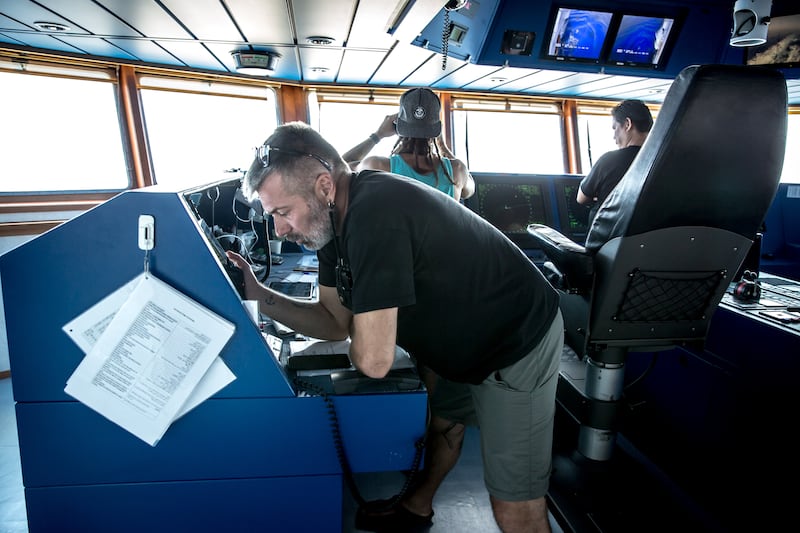 Riccardo Gatti, search-and-rescue team leader on the Geo Barents, uses apps to monitor the central Mediterranean. Photograph: Sally Hayden