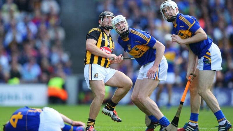 Kilkenny’s Richie Hogan watches a point attempt as Michael Cahill and Brendan Maher of Tipperary look on during  the drawn All-Ireland hurling final on September 7th at Croke Park. Photograph: Ryan Byrne / Inpho