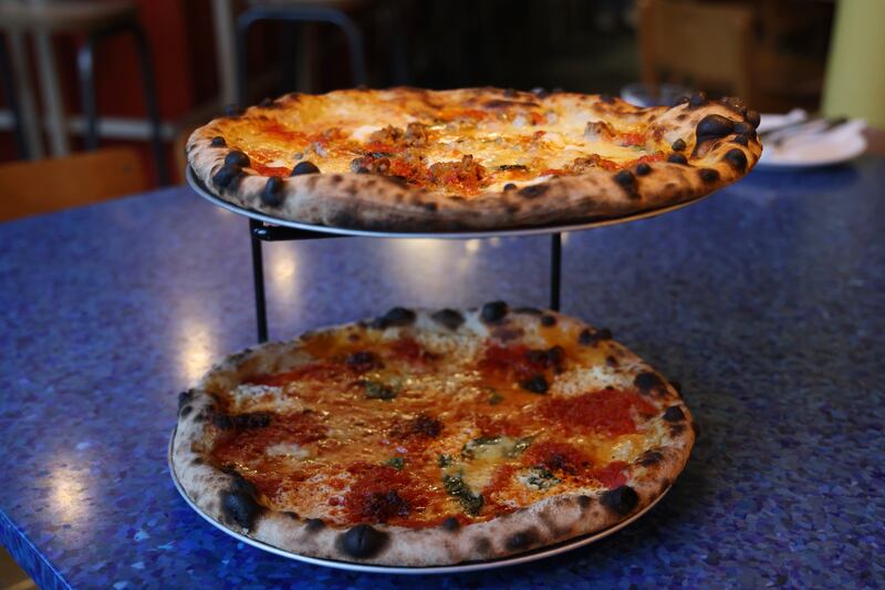 Sausage, stracciatella and chilli pizza (top) and nduja, ricotta and honey pizza. Photograph: Bryan O’Brien

