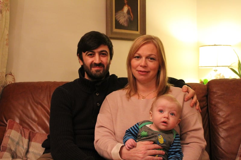 Giovanni Fusciardi and Cynthia Crane Fusciardi, with baby Leonardo. The new family are living out of one room in Gio’s parents’ house. Photograph: Jack Power