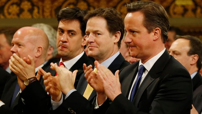 Prime minister David Cameron (right), Labour Party leader Ed Miliband (second left) and deputy prime minister Nick Clegg (centre). Photograph: Lefteris Pitarakis/PA Wire