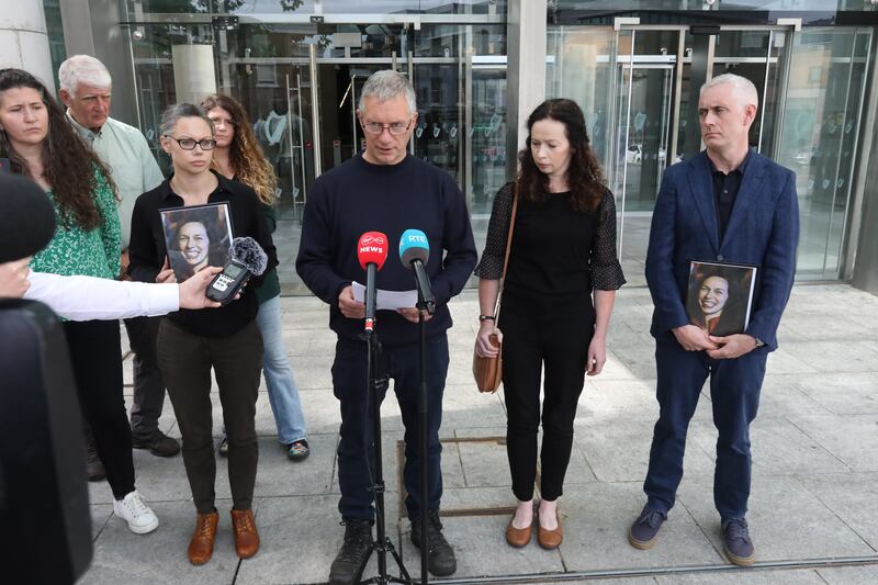 Veronica French Holding a photo of Valerie French Kilroy , David French Hilary French and Kevin Hosford holding a photo of Valerie French Kilroy outside the Central Criminal Court Photograph: Collins Courts