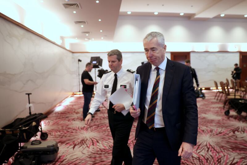 Chief Constable Jon Boutcher (right) and Temporary Deputy Chief Constable Chris Todd leave the press conference at Stormont Hotel in Belfast following the publication of the Operation Kenova Interim Report into Stakeknife, the British Army's top agent inside the IRA in Northern Ireland during the Troubles. Liam McBurney/PA Wire