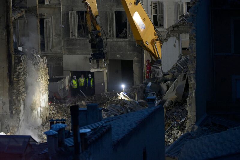 The collapse caused a fire that has complicated rescue efforts and investigations, and it has not been brought under control. Photograph: Clement Mahoudeau/AFP via Getty Images