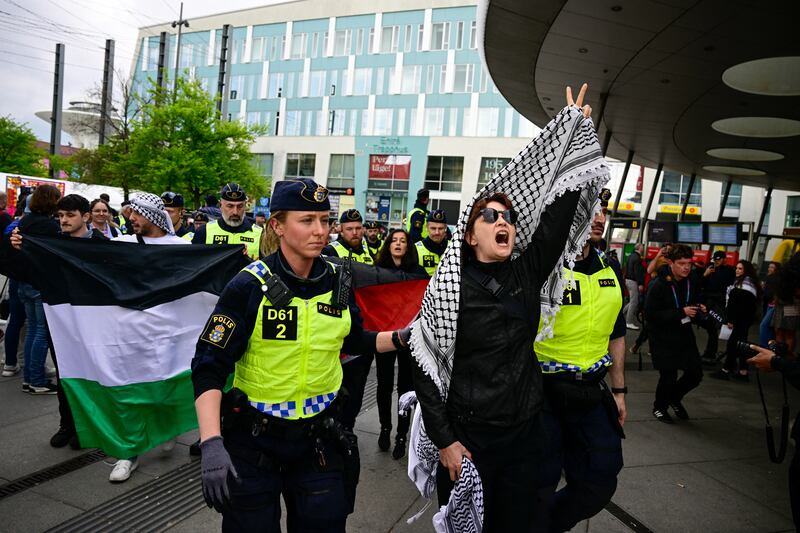 Police remove pro-Palestinian protesters opposing Israel's participation in the 68th edition of the Eurovision Song Contest. Photograph: Tobias Schwarz/AFP via Getty