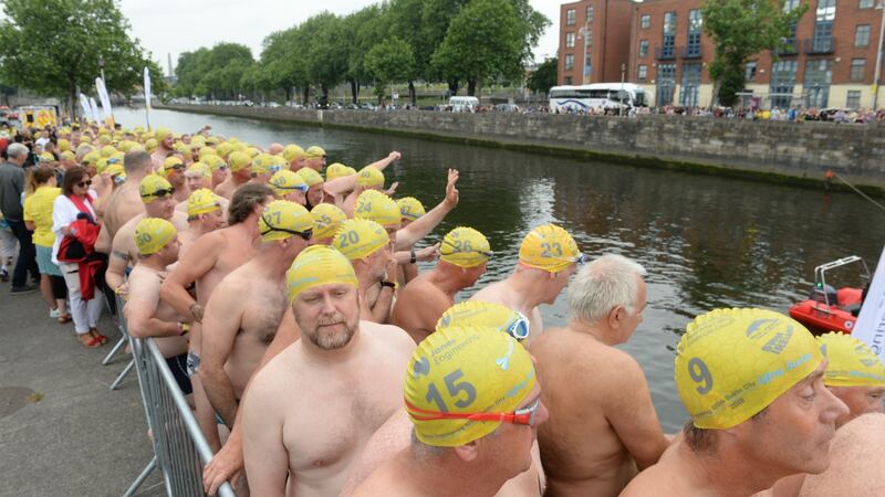 Participants line up for the 100th Liffey Swim Photograph: Dara Mac Donaill / The Irish Times