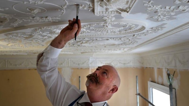 George O’Malley restoring the plaster work at Belvedere College Dublin. Photograph: Dara Mac Dónaill