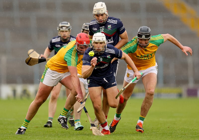 Toomevara’s Jack and Andrew Ryan take on Loughmore's Ed and Ciaran Connolly. Photograph: James Crombie/Inpho