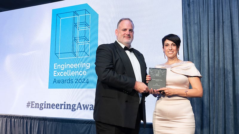 Graham Heaslip, awards judging coordinator, presents the women in engineering award to Dr Cristina Paduano, B-Fluid