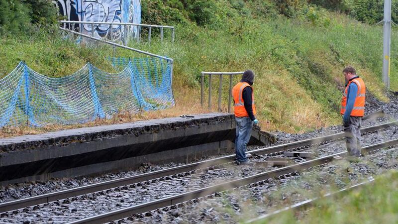 Irish Rail workers on the line near Shankill, Co Dublin  after  Dart  services were disrupted due to cable theft. Photograph: Eric Luke/The Irish Times