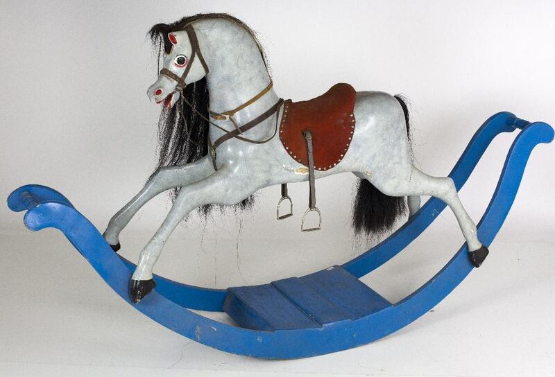 Lot 677, wooden rocking horse