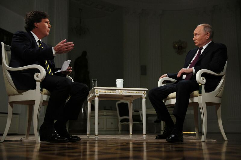 Russian president Vladimir Putin is interviewed by  Tucker Carlson at the Kremlin last week. Photograph: Gavriil Grigorov/Sputnik/AP