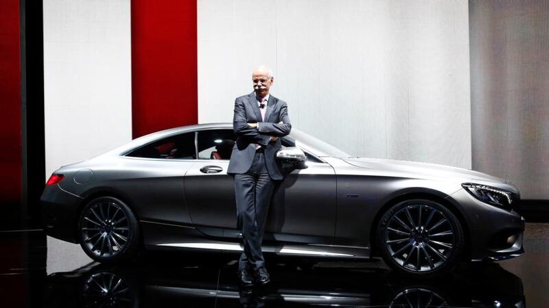 Dieter Zetsche, chief executive officer of Daimler AG, poses with the new Mercedes-Benz S-Class coupe