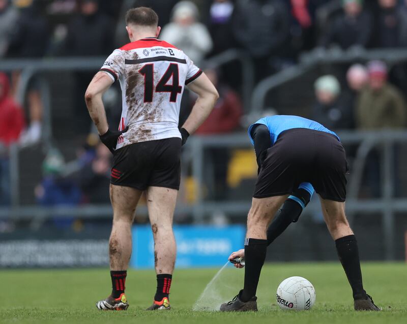 Referee Barry Tiernan marks a free. Photograph: James Crombie/Inpho