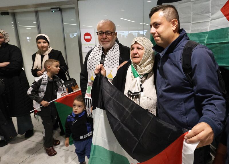 Ibrahim Alagha with his parents Sami and Marwa at Dublin Airport on Saturday. Photograph: Nick Bradshaw