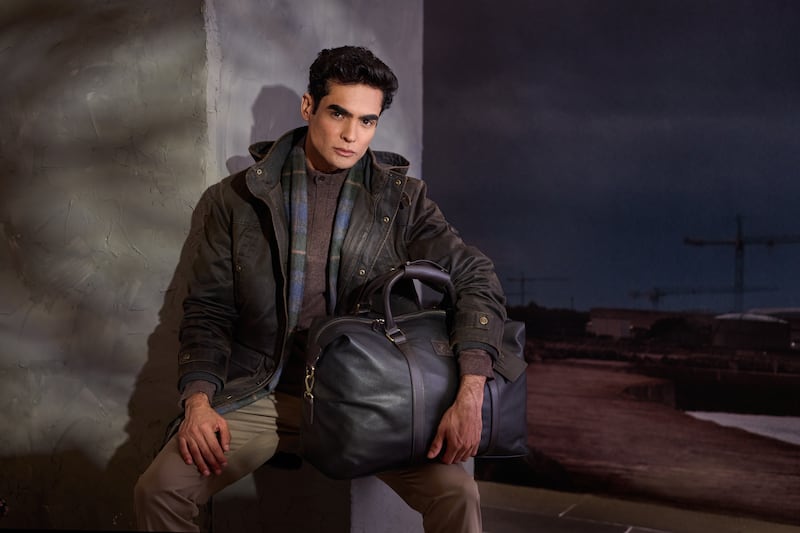 Waxed jacket €150, scarf €25, cashmere jumper €140, leather holdall €200, chinos €60, Paul Costelloe