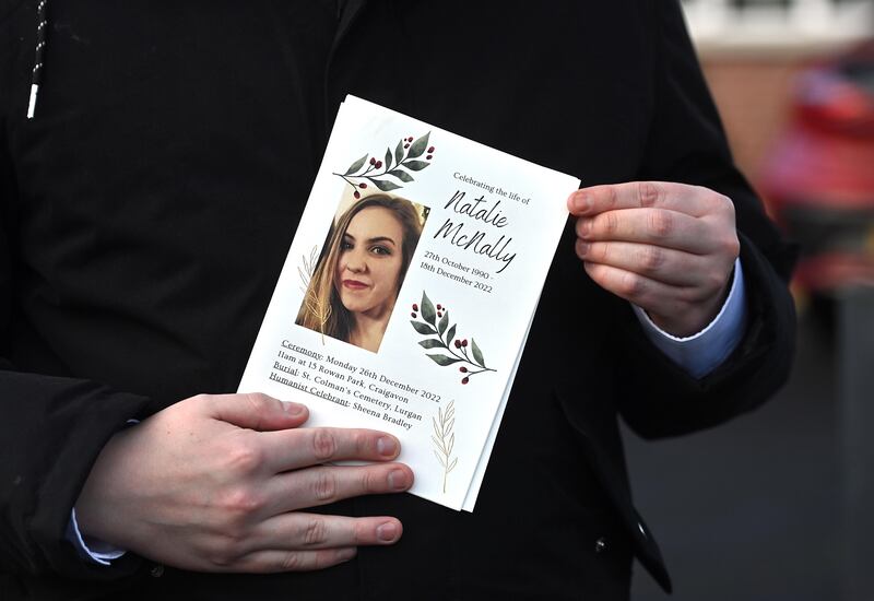 A mourner holds a order of service during the funeral of murder victim Natalie McNally at her parents' home in Lurgan, Co Armagh, in recent days. Photograph: Oliver McVeigh/PA