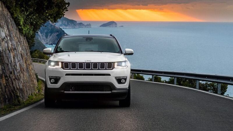 The brand’s signature seven-slot grille runs the width of the front of the Jeep Compass