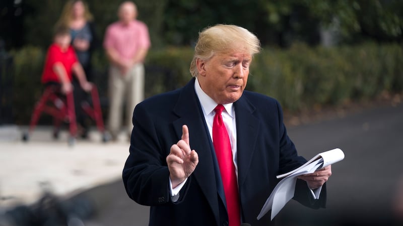 President Donald Trump speaking to the media about Gordon Sondland’s testimony on the White House lawn on Wednesday. Photograph: Jim Lo Scalzo/EPA