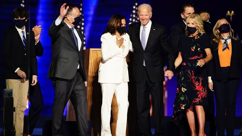 US president-elect Joe Biden, his wife Jill Biden, vice president-elect Kamala Harris  and her husband Doug Emhoff on stage during a celebratory event held outside of the Chase Center in Wilmington, Delaware. Photograph: Jim Lo Scalzo/EPA