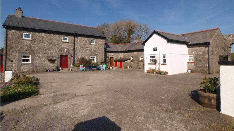 The Claremorris property comes with stone outbuildings and its own orchard