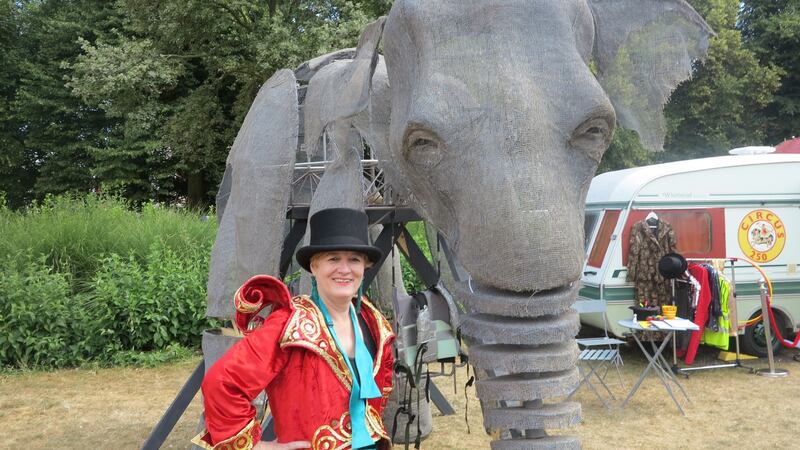 Dea Birkett with a lifesize elephant puppet