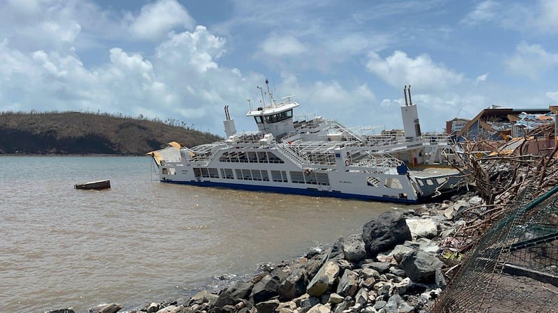 An inter-island barge is stranded among debris in Mamoudzou after Cyclone Chido hit France's Indian Ocean territory of Mayotte. Photograph: KWEZI/AFP via Getty Images