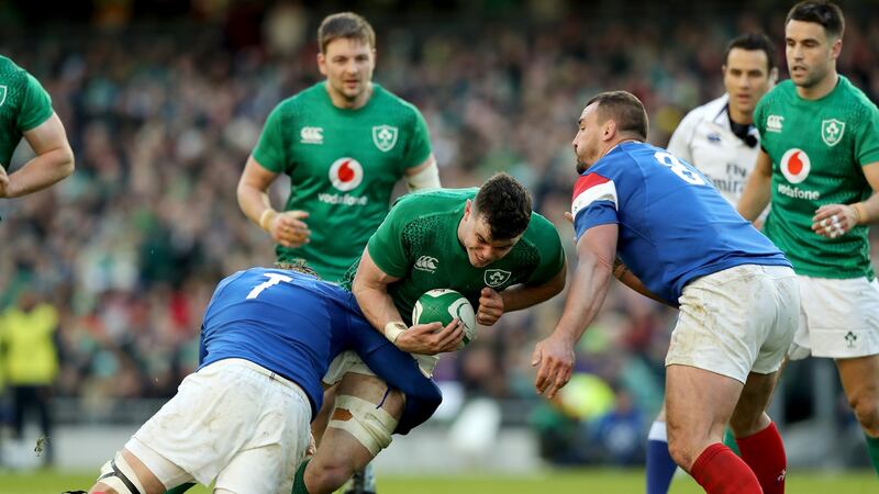 James Ryan of Ireland is tackled by Arthur Iturria and Louis Picamoles. Photograph:  David Rogers/Getty Images