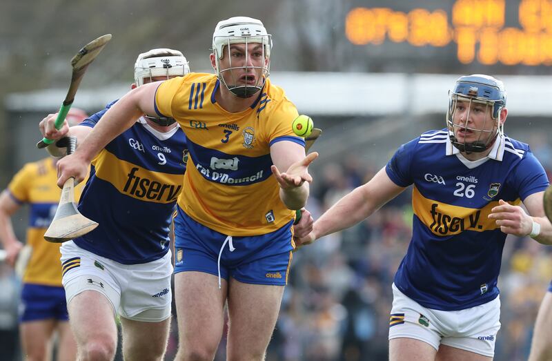 Munster GAA Senior Hurling Championship Round 1, Cusack Park, Ennis, Co. Clare 23/4/2023
Clare vs Tipperary
Clare's Conor Cleary tackled by Seamus Kennedy and Alan Tynan of Tipperary
Mandatory Credit ©INPHO/Lorraine O’Sullivan