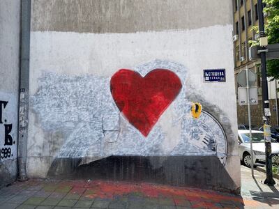 A mural of the convicted war criminal Radovan Karadžić was painted over following the mass shootings in Belgrade 