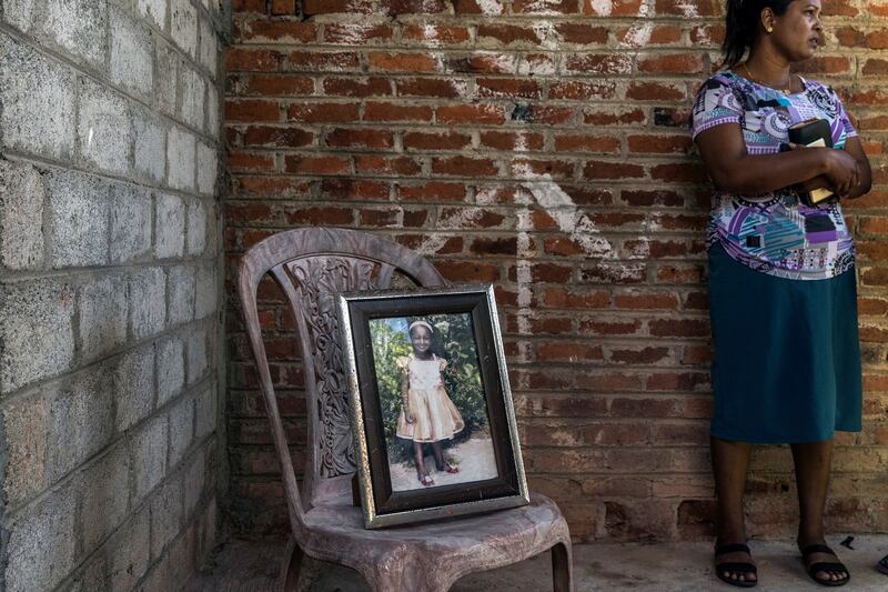 A photo of Sneha Savindi is displayed at her home in Negombo, Sri Lanka during her wake. Photograph: Adam Dean/The New York Times