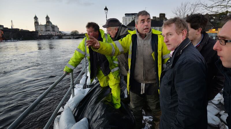 Boxer Moran with Taoiseach Enda Kenny on the banks of the east side of the River Shannon in Athlone. Photograph: Alan Betson/The Irish Times