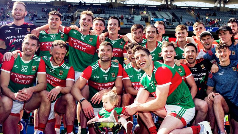 Mayo’s Lee Keegan celebrates with his daughter Líle in the JJ Nestor Cup after the win over Galway in the Connacht SFC Final at Croke Park on July 25th, 2021. Photograph: Tommy Dickson/Inpho