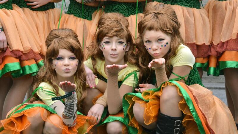 Hannah Barwinska, Natalia Gil and Veronika Blaszczak (all age 11 from Polish School SEN) participate in the Brighter Futures pageant during the St Patrick’s Day parade in Dublin last Tuesday. Photograph: Barbara Lindberg.