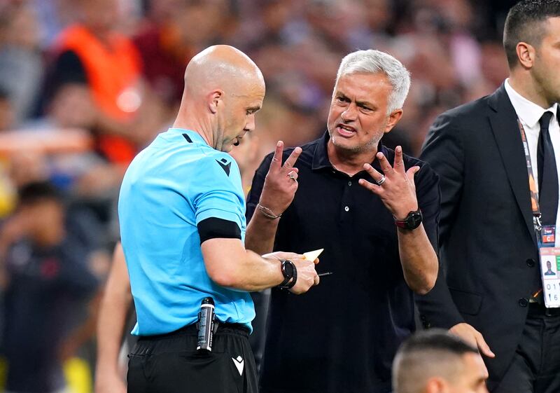 Roma manager Jose Mourinho exchanges words with referee Anthony Taylor during the UEFA Europa League Final at the Puskas Arena, Budapest. Photograph: Adam Davy/PA Wire