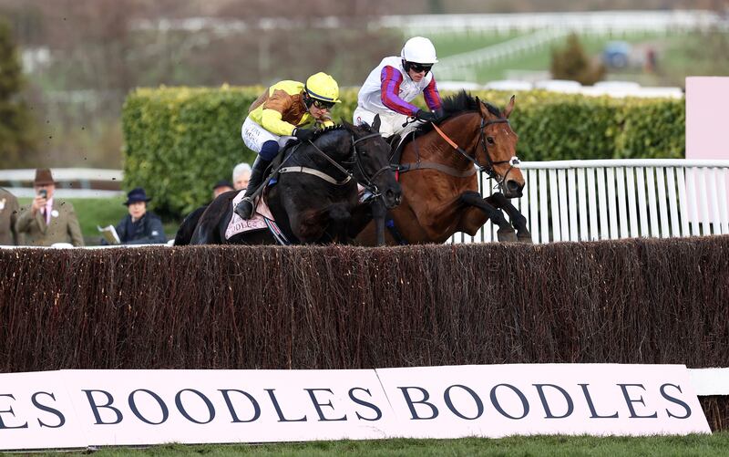 Paul Townend aboard Galopin Des Champs (left) jumps the last ahead of Harry Cobden aboard Bravemansgame on their way to winning the Gold Cup last year. Photograph: Ryan Pierse/Getty Images