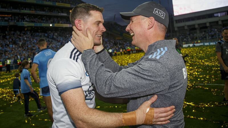 Dublin captain Stephen Cluxton celebrates with manager Jim Gavin after the victory over Kerry in the All-Ireland SFC replay at Croke Park. Photograph: Oisín Keniry/Inpho