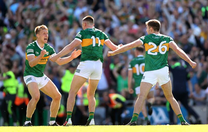 Killian Spillane and Adrian Spillane celebrates with Sean O’Shea at the final whistle following Kerry's win over Dublin at Croke Park. Photograph: James Crombie/Inpho
