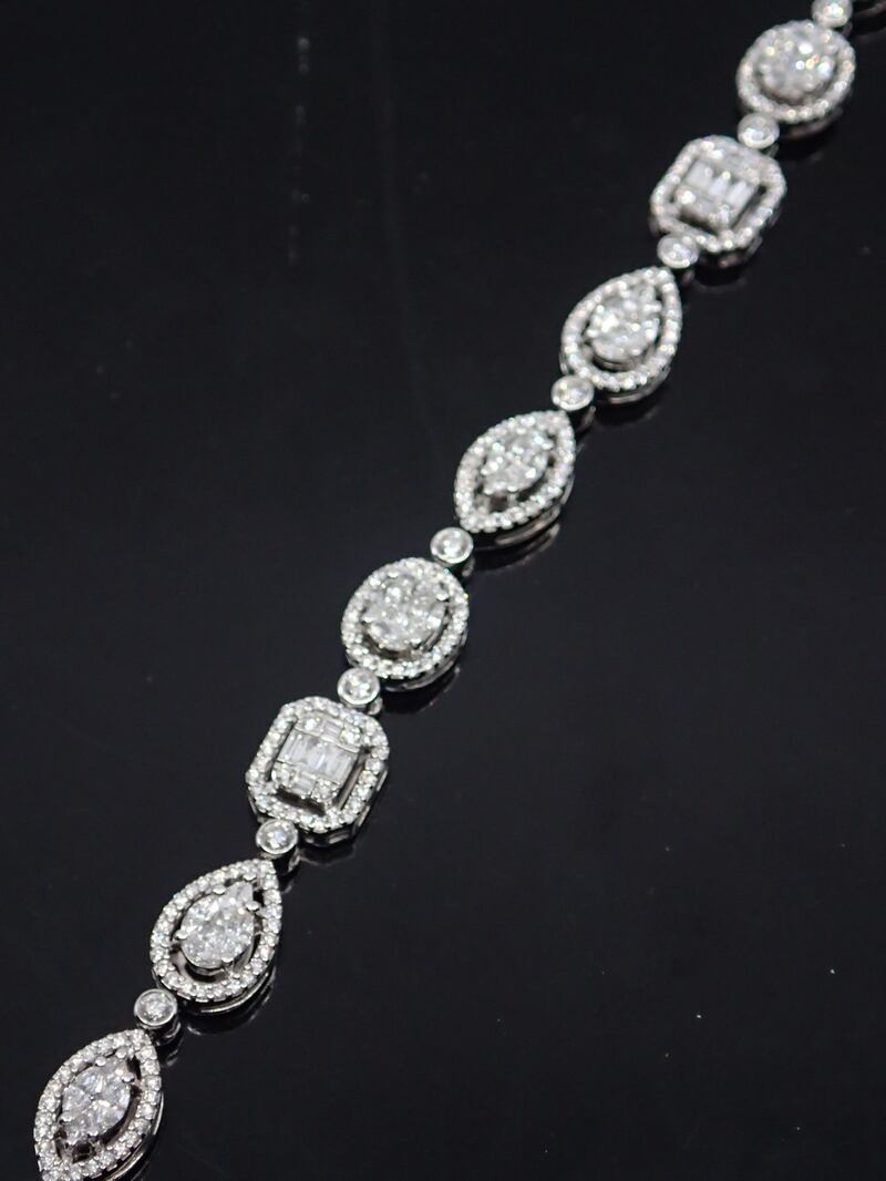 Diamond cluster bracelet €5,300-€5,800, John Weldon