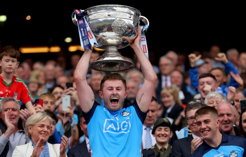 Jack McCaffrey lifts the Sam Maguire Cup after Dublin's victory over Kerry in the All-Ireland final. Photograph: James Crombie/Inpho
