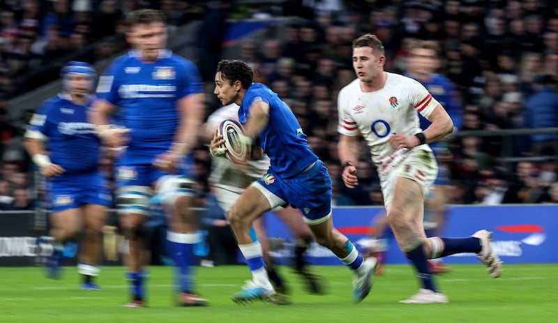 Italy’s Ange Capuozzo in action against England. Photograph: Tom Maher/Inpho