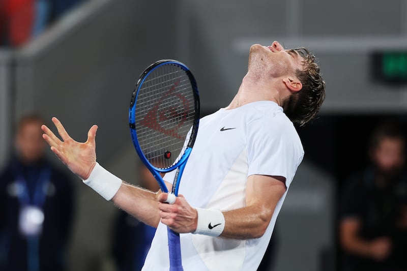 Jack Draper celebrates winning match point in his men's singles third round match against Aleksandar Vukic. Photograph: Clive Brunskill/Getty Images