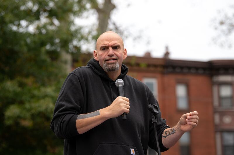 John Fetterman speaks to supporters gathered in Dickinson Square Park in Philadelphia as he campaigns for the US Senate. Photograph: Kriston Jae Bethel/AFP