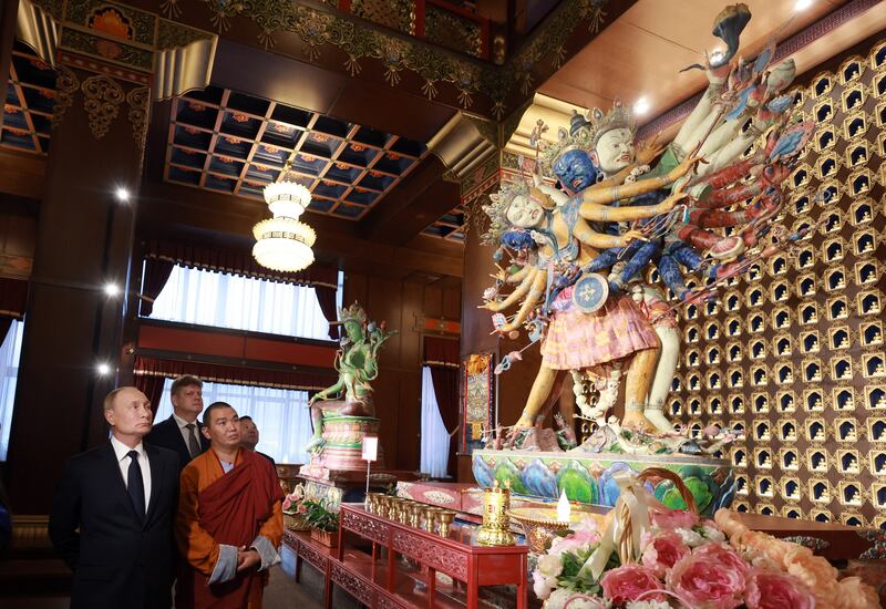 Russian president Vladimir Putin visits the country's largest Buddhist monastery in Kyzyl on Monday. Photograph: Vyacheslav Prokofyev/AFP via Getty Images