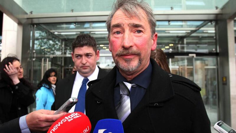 Eugene Moloney’s brother Sean speaks to reporters outside the Criminal Courts building in Dublin today after Gary Burch was jailed for three and a half years for the journalist’s death.  Photograph: PA