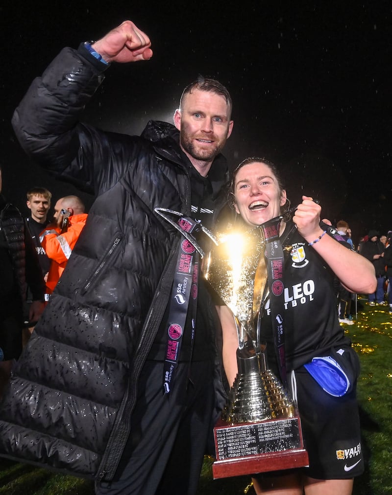 Athlone Town manager Ciarán Kilduff and captain Laurie Ryan celebrate with the trophy after defeating Bohemians to win the SSE Airtricity Women's Premier Division title at Athlone Town Stadium. Photograph: Sam Barnes/Sportsfile