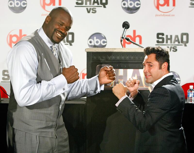 August 2008:  Shaquille O' Neal and Oscar De La Hoya pose ahead of their bout in Paradise, Nevada. Photograph: Ethan Miller/Getty Images