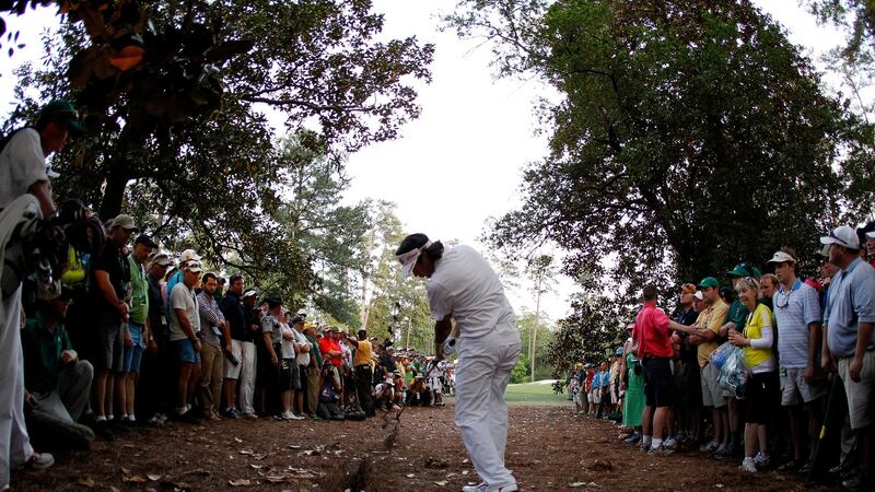 Bubba Watson plays his famous shot from the pine straw at the 10th hole during the 2012 playoff. Photo: Streeter Lecka/Getty Images