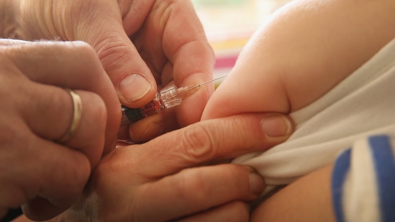 A child gets the MMR vaccine. There are currently several mumps outbreaks in Ireland. File photograph: Sean Gallup/Getty Images