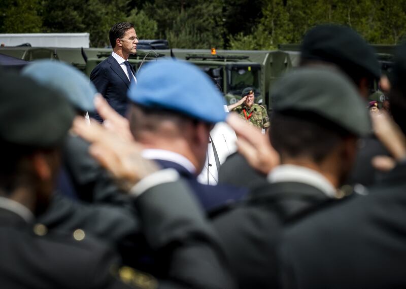 Dutch prime minister Mark Rutte delivers a speech during a meeting with veterans who had to guard the Bosnian enclave of Srebrenica in 1995. They are receiving formal apologies from the Dutch government.  Photograph: Remko de Waal/ANP/AFP